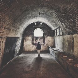 People walking in tunnel