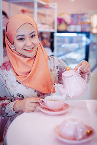 Portrait of a smiling young woman