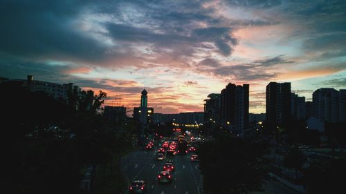 Panoramic view of city against sky during sunset