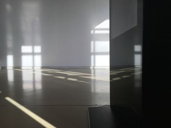 Close-up of sunlight reflecting on floor