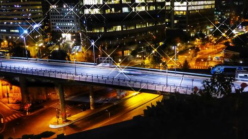 High angle view of light trails on street at night