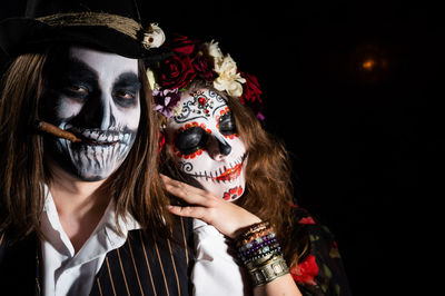 Portrait of a serious young woman wearing mask