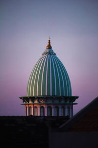 High section of mosque against clear sky