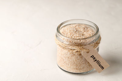 High angle view of glass jar on table