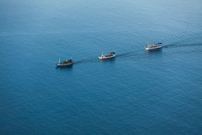 High angle view of boats sailing in sea