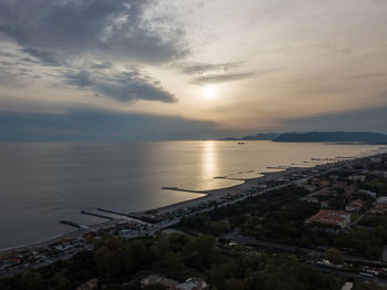 High angle view of sea against sky during sunset