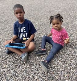 My grandson and grand daughter watching their tablet