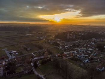 High angle view of townscape against sky during sunset