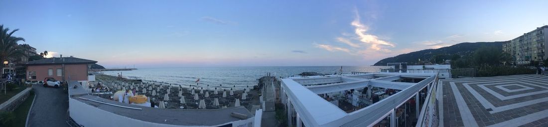 Panoramic view of sea against sky during sunset