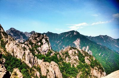 Scenic view of rocky mountains against sky