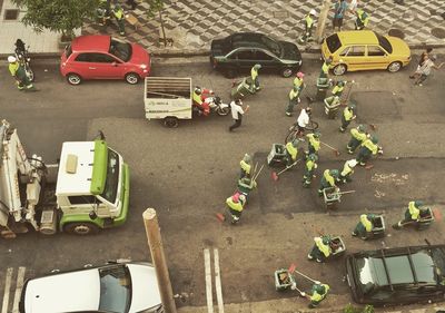 High angle view of sanitation worker in street