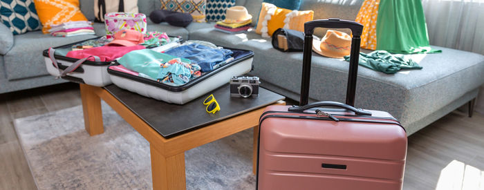 High angle view of suitcase on floor at home