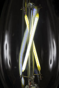 Close-up of illuminated electric lamp