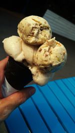 Midsection of person holding ice cream