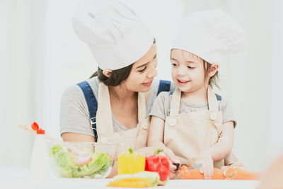Full length of mother and daughter