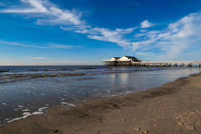 Scenic view of beach against sky