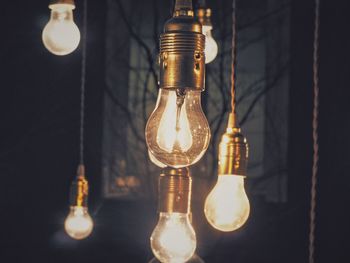 Close-up of illuminated light bulbs