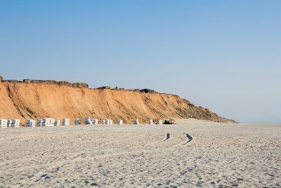 Scenic view of beach against clear sky