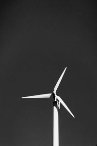 Low angle view of wind turbine against sky