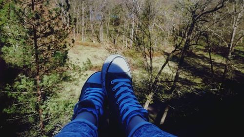 Low section of people in forest