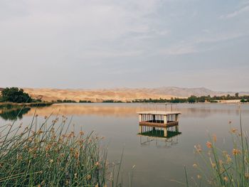 Scenic view of lake against sky