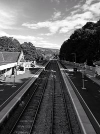 Railroad station platform against sky