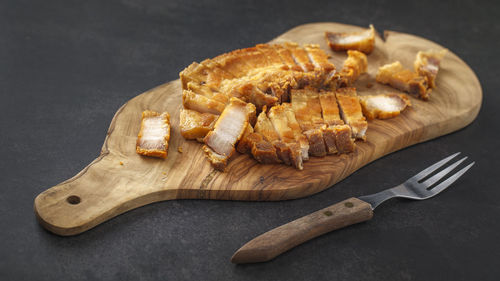 High angle view of bread on cutting board