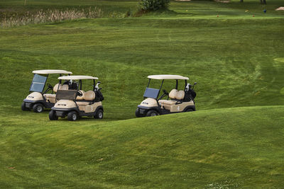 Golf carts on field