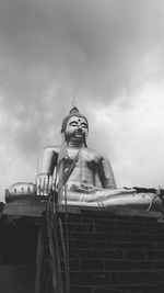 Low angle view of statue against sky