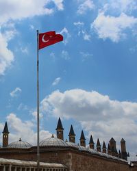 Low angle view of flag against sky