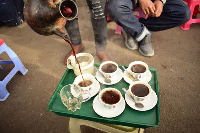 High angle view of coffee cups on table