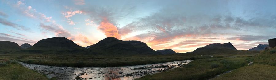 Scenic view of mountains against sky during sunset