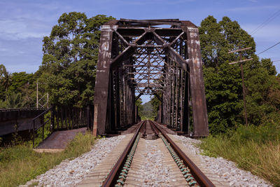 View of railroad tracks against trees