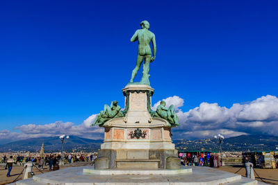 Statue of liberty against blue sky