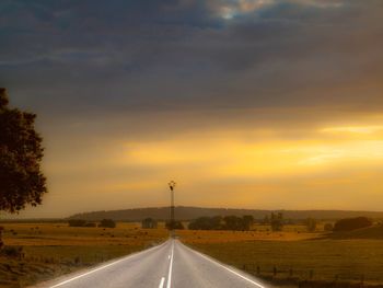 Road against sky during sunset