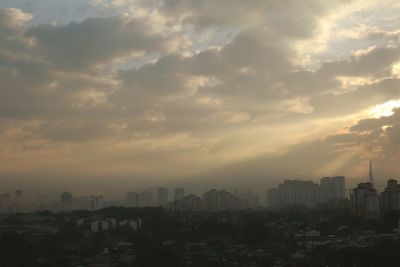 Cityscape against sky during sunset