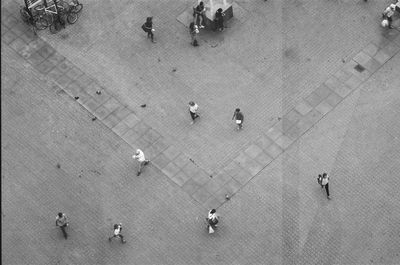 High angle view of people walking on street