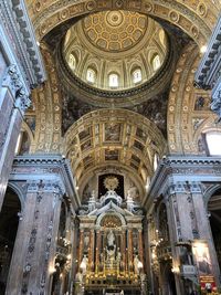 Low angle view of illuminated ceiling of a church