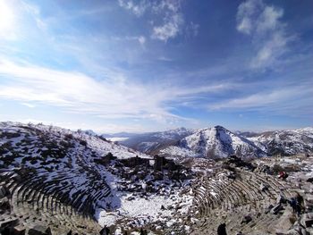 Scenic view of snowcapped mountains against sky