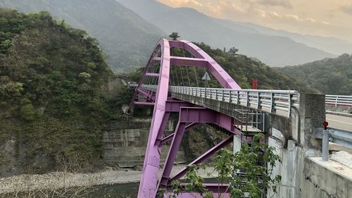 View of bridge against mountains