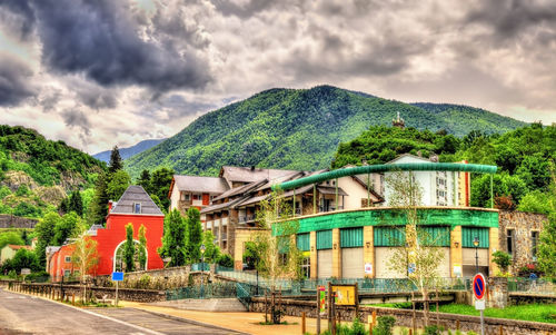 View of buildings against cloudy sky