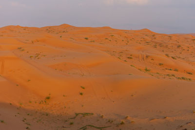 Scenic view of desert against sky