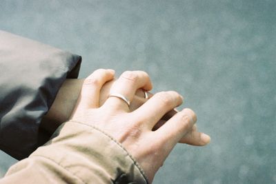 Close-up of person holding hands