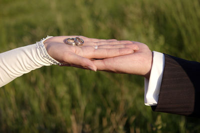 Cropped hand of woman holding hands