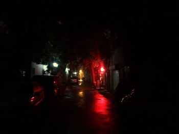 View of illuminated street at night