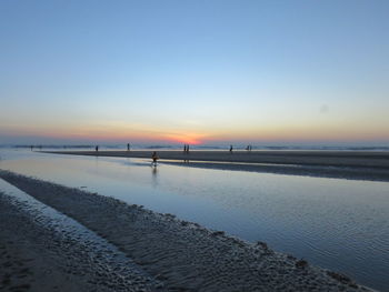 Scenic view of sea at sunset