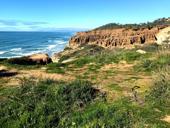 View of rock formations at seaside