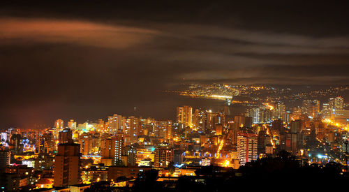 Illuminated cityscape at night