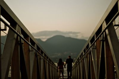 Silhouette of woman against clear sky