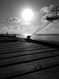 Pier on sea against sky